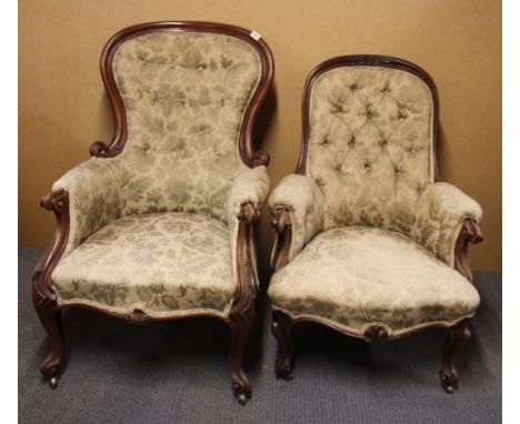A pair of 19th Century button backed mahogany armchairs.