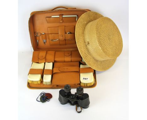 A vintage Tress &amp; Co. straw boater with a gentleman's pig skin travelling case and other items.