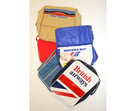 A group of vintage travel bags.