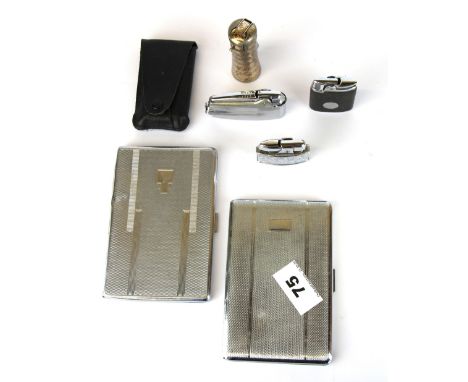 A group of vintage lighters and cigarette cases.