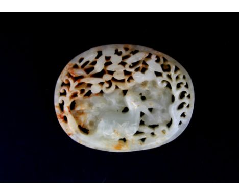 A 19th/ early 20th Century Chinese carved jade panel (probably from a box lid), W. 7.5cm.