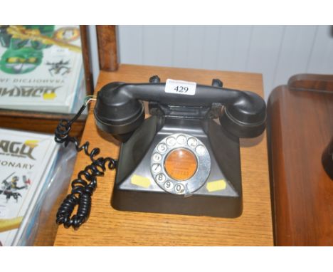 A Rotary dial telephone