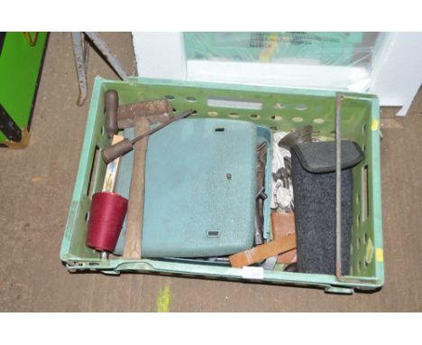 A box containing various hand tools 