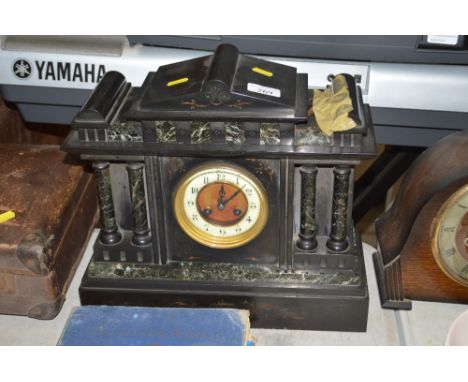 A late Victorian slate mantel clock 
