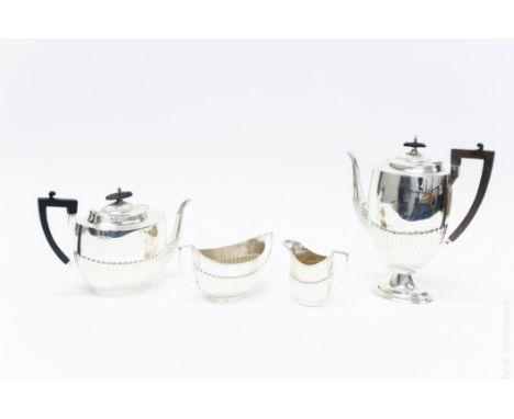 Sheffield Sterling silver Coffee & Tea service. Comprising coffee pot, teapot, sugar bowl & creamer. (Coffee & teapots: Walke