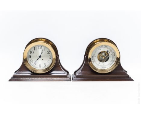 Large scale Chelsea ships bell clock, time and strike movement; and a matching Holosteric Barometer. Each in conforming mahog