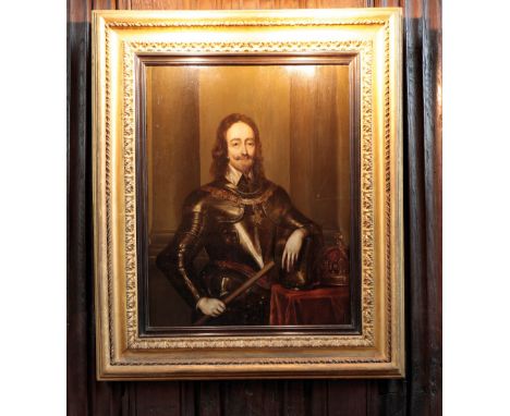AFTER SIR ANTHONY VAN DYKE A portrait of Charles I in armour resting his arm on a helm, the crown to one side, oil on panel, 