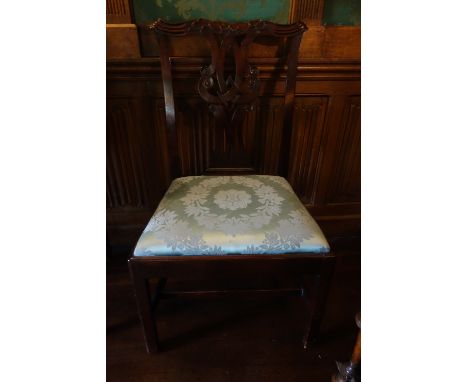 A SET OF FOUR GEORGE III STYLE MAHOGANY DINING CHAIRS, 19th century, of Chippendale design with carved serpentine cresting ra