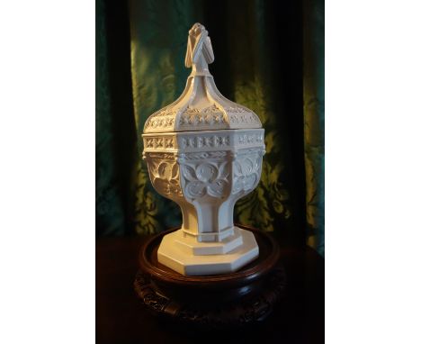 A MINTON GLAZED PARIANWARE MODEL OF A FONT, circa 1860, with an octagonal body and lid moulded with tracery masks and Gothic 