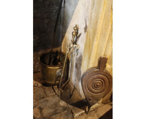 A COPPER LOG BUCKET with repousse decoration, 14" high; a brass coal bucket repousse with hounds and miscellaneous fire tools