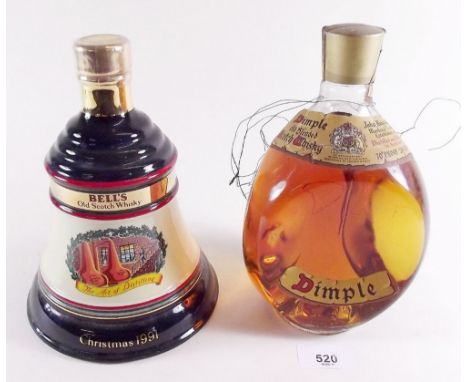 A Bells 1991 whisky decanter and a Dimple bottle of whisky