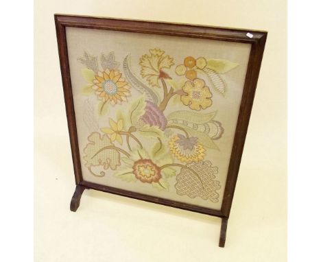 An oak frame firescreen with embroidered panel 