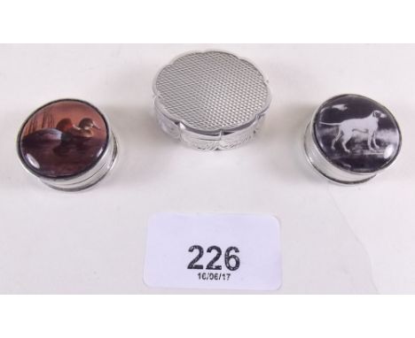 A silver engraved pill box - 25g and two enamel and silver pill boxes 