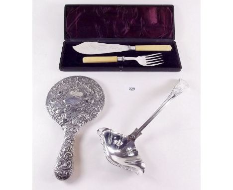A silver backed hand mirror a/f, a silver plated ladle  and a pair of silver plated fish servers boxed