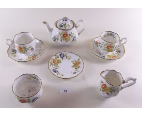 A Royal Albert breakfast set painted flowers comprising: teapot, two cups and saucers, milk a/f and sugar and stand 