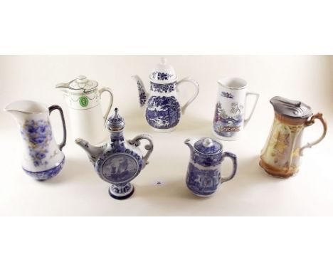 Four various jugs, a Broadhurst coffee pot, Abbey water jug and Delft ewer