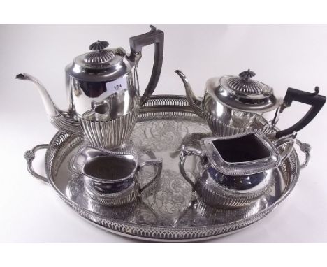 A silver plated four piece tea service on tray