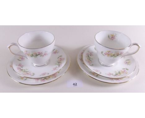 A Duchess Honeysuckle tea service comprising six cups and saucers and six tea plates