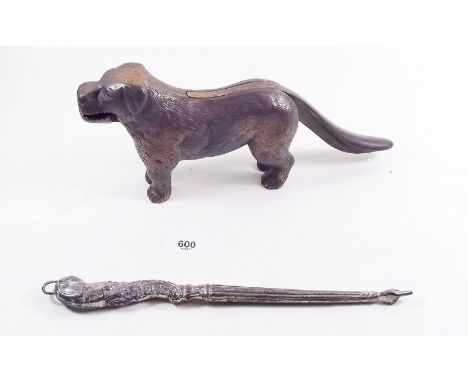A dog nutcracker and a Torah pointer