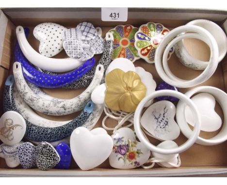 A box of Royal Worcester proto type porcelain jewellery designed by Kenneth Jay Lane in the 1970's (never put into production