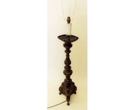 A Flemish baroque copper standing candlestick circa 1700 -  wired for electricity