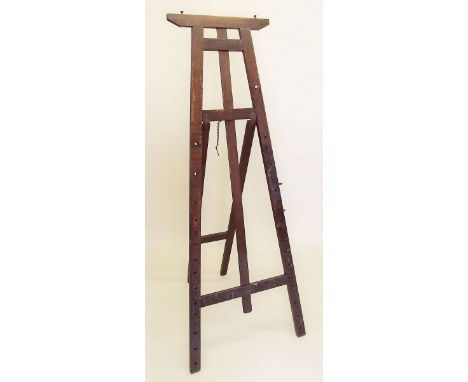 A large stained pine easel 