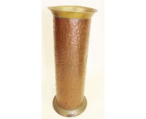 A copper and brass stick stand 