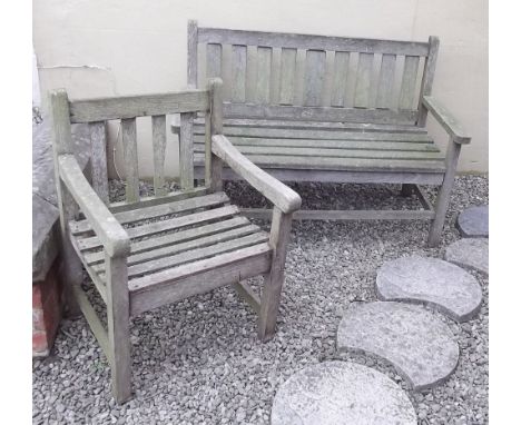 A wooden garden bench and single matching seat 