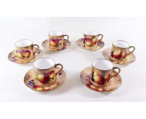 A set of six Royal Worcester coffee cups and saucers painted fruit and signed S. Smith 
