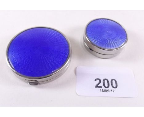 A 'Vogue' enamel pill box and compact 