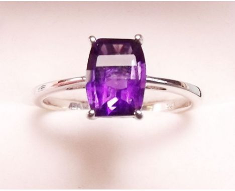 A silver and amethyst ring 
