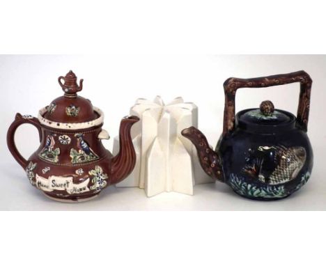 Bargeware teapot, majolica teapot moulded with fish, and a pottery jelly mould. Condition report: see terms and conditions.