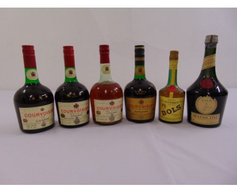Four bottles of Courvoisier cognac, a bottle of Benedictine and a bottle of Bols Monastique