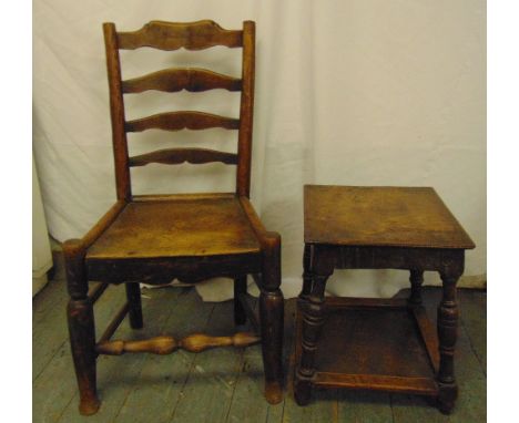 An early 18th century fruitwood and elm ladder-back chair with solid seat and a oak rectangular side table