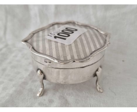 A shaped circular ring box on four pad feet, 2.5" wide, Birmingham 1909