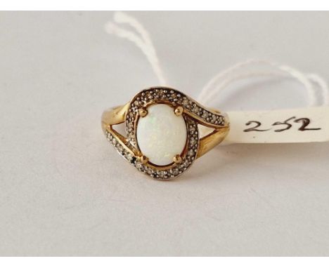 A opal and diamond ring 9ct size K 2.4 gms