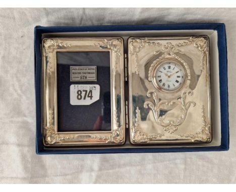 A combined hinged photo frame and mantel clock with embossed decoration, 4.5" high