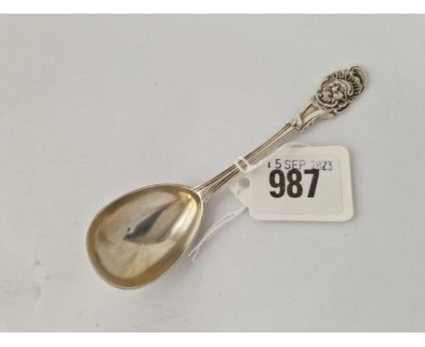 Another Victorian caddy spoon, the stem decorated with a mask. London 1848 By H H