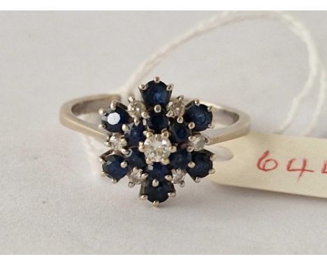 A WHITE GOLD SAPPHIRE AND DIAMOND CLUSTER RING 18CT GOLD SIZE X 4.8 GMS