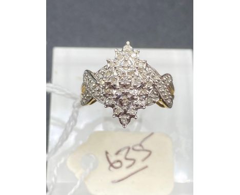 A multi stone cluster ring with diamond criss-cross shoulders 10ct gold size O 3.1 gms 