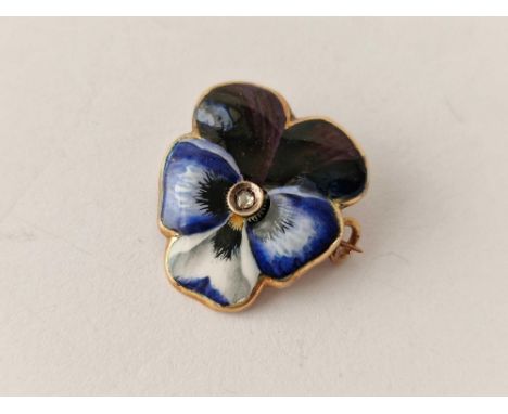 A Edwardian gold diamond set and enamel pansy brooch AF