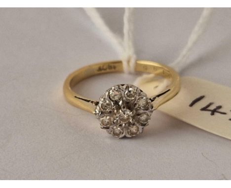 Antique diamond cluster ring set in platinum with an 18ct (stamped) shank, size L