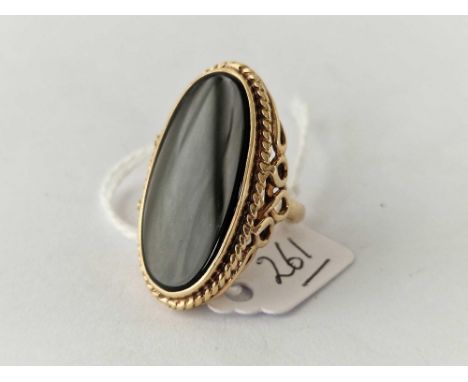 A very large black stone ring 9ct size N