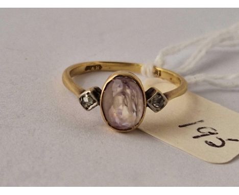 A amethyst and diamond three stone ring 9ct size O  2 gms