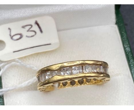 A  WHITE STONE FULL ETERNITY RING  with SQUARE CUT WHITE STONES BY BULGARI IN HIGH CARAT GOLD SIZE M 6.6 GMS