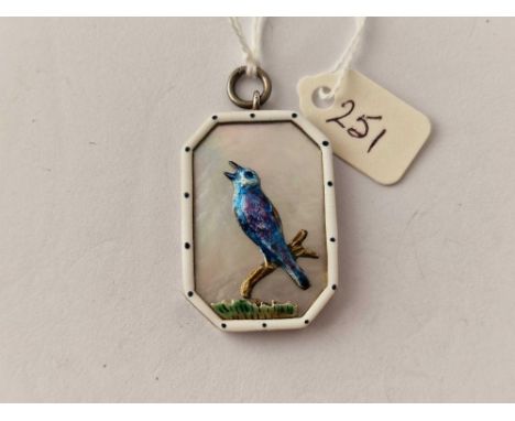 A Edwardian silver enamel and MOP bird pendant