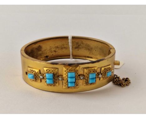 A 19th century gilt bangle with turquoise