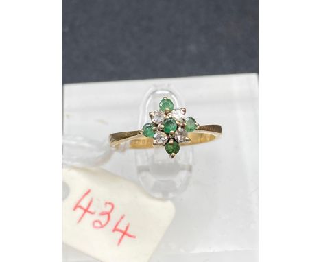 A emerald and diamond cluster ring 9ct