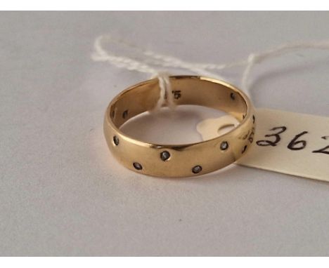 A twelve diamond eternity ring 9ct size P 3.2 gms