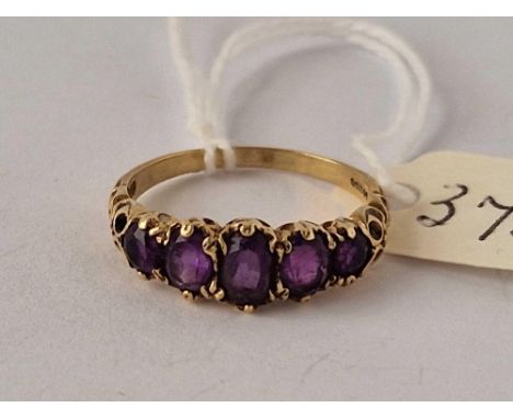 A five stone amethyst half hoop ring 9ct size R 2.5 gms